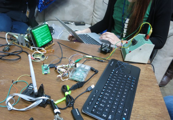 Emily green tinted LED on NUCC table at Sparklecon