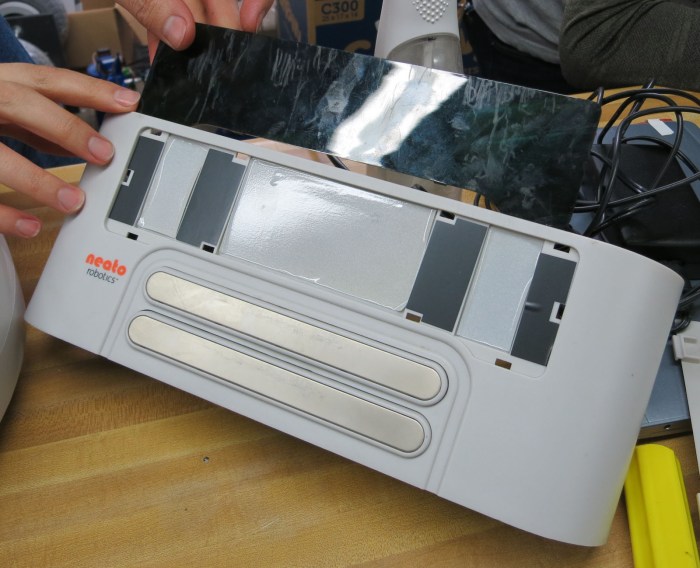 Neato charging dock mystery panel demystified