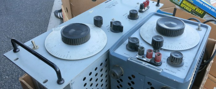 Old test equipment in cardboard boxes.jpg