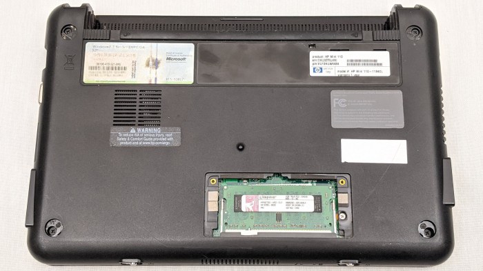 HP Mini 110-1134CL screws hiding under feet